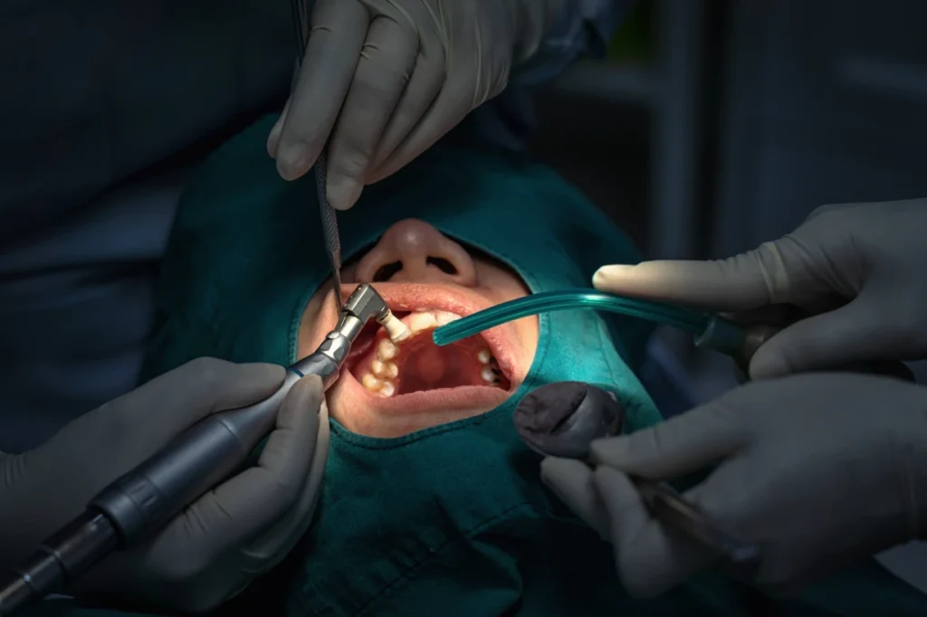 Dentist and Assistant Performing Checkup